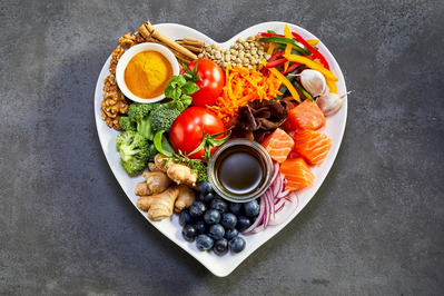 heart plate with healthy foods on it